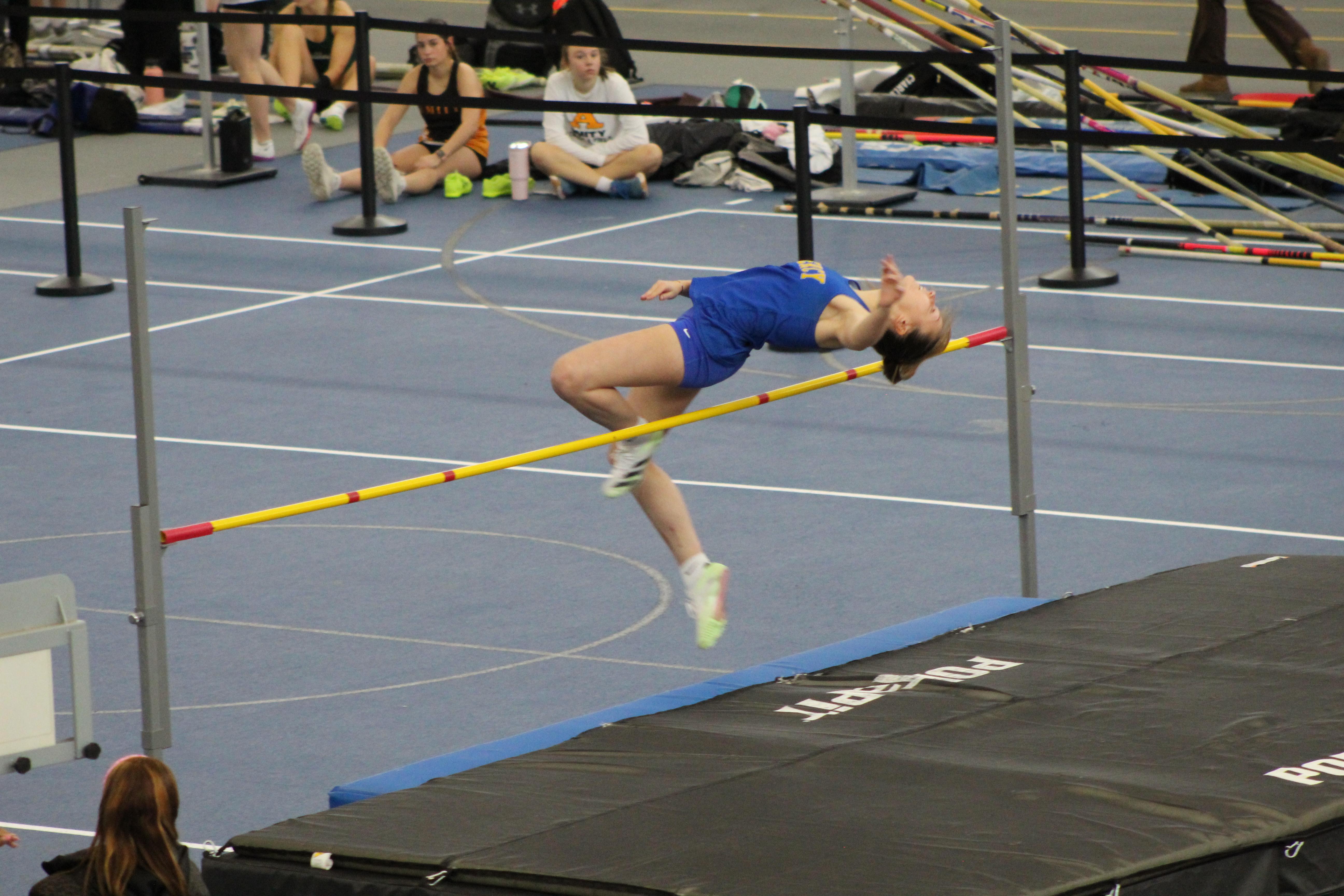 Maddie Scarfo high jumps at the state championship