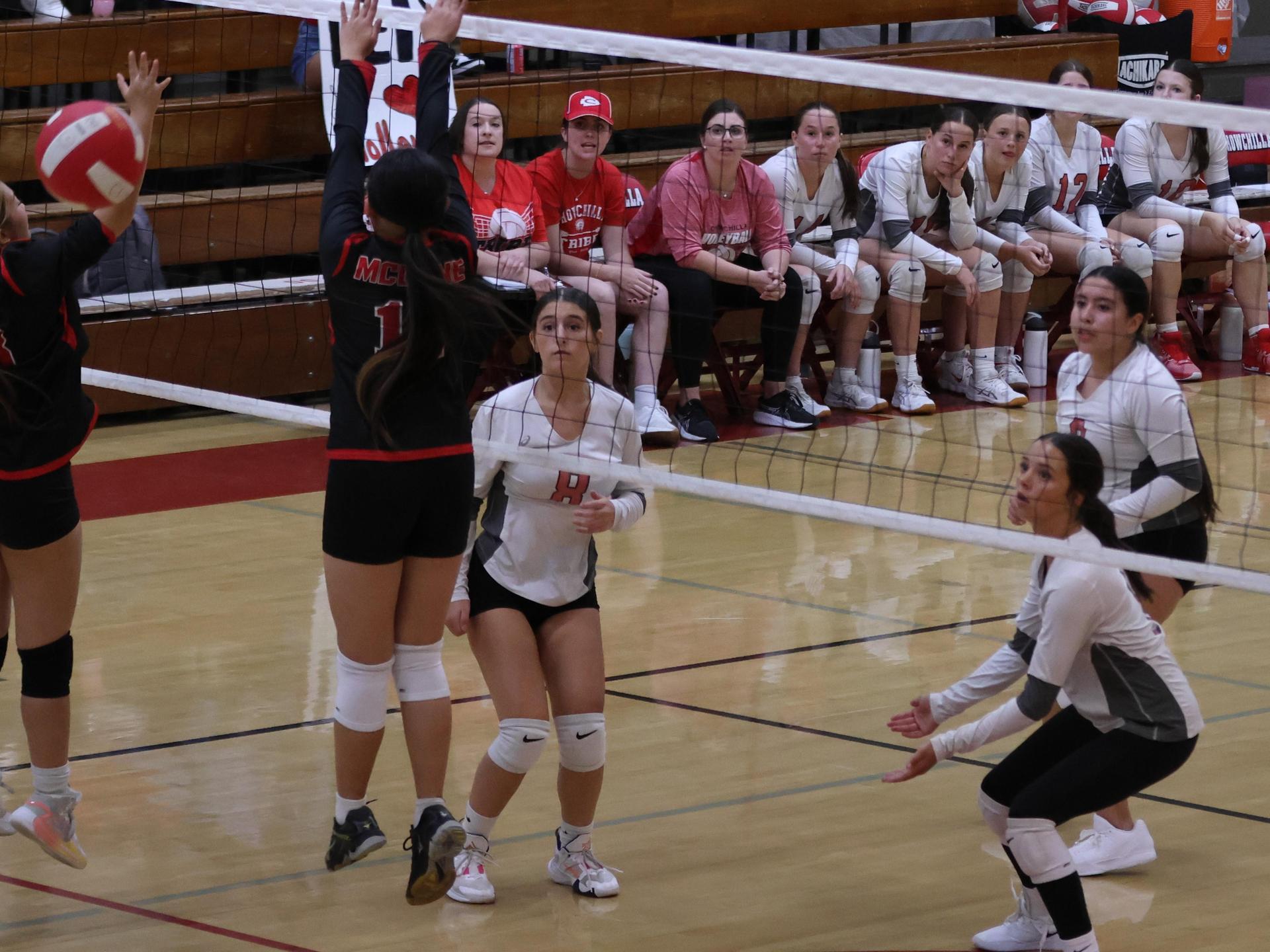 junior varsity girls playing volleyball 65