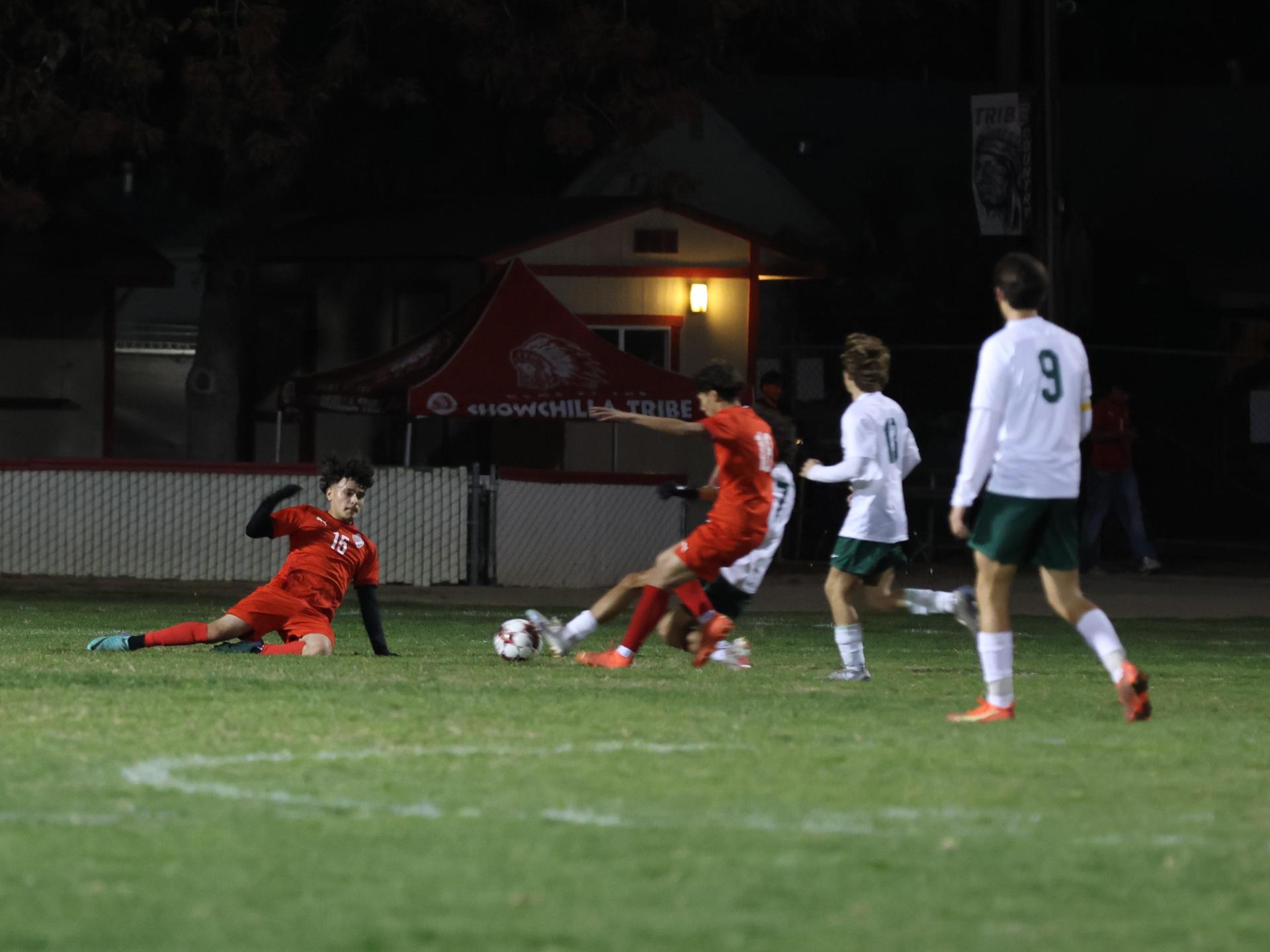 Varsity boys play soccer against Kingsburg