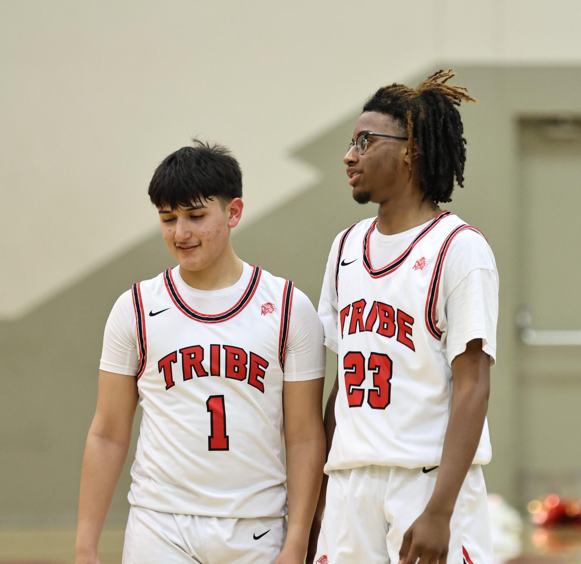 junior varsity boys playing basketball against yosemite