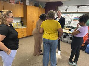 Administrators take in the information