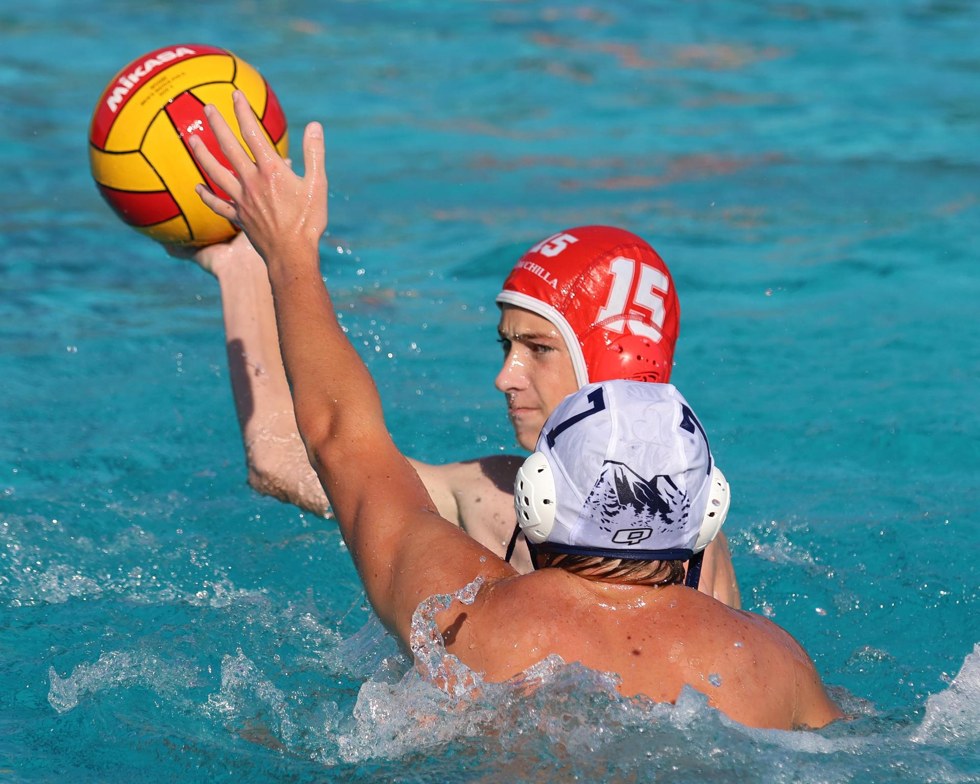 Boys playing water polo against Yosemite