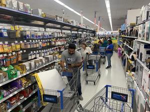 Teachers fill the school supply aisle during shopping spree