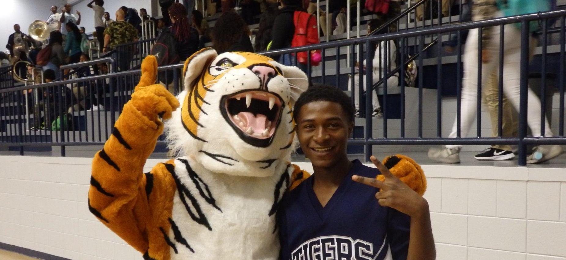 tiger mascot and cheerleader male