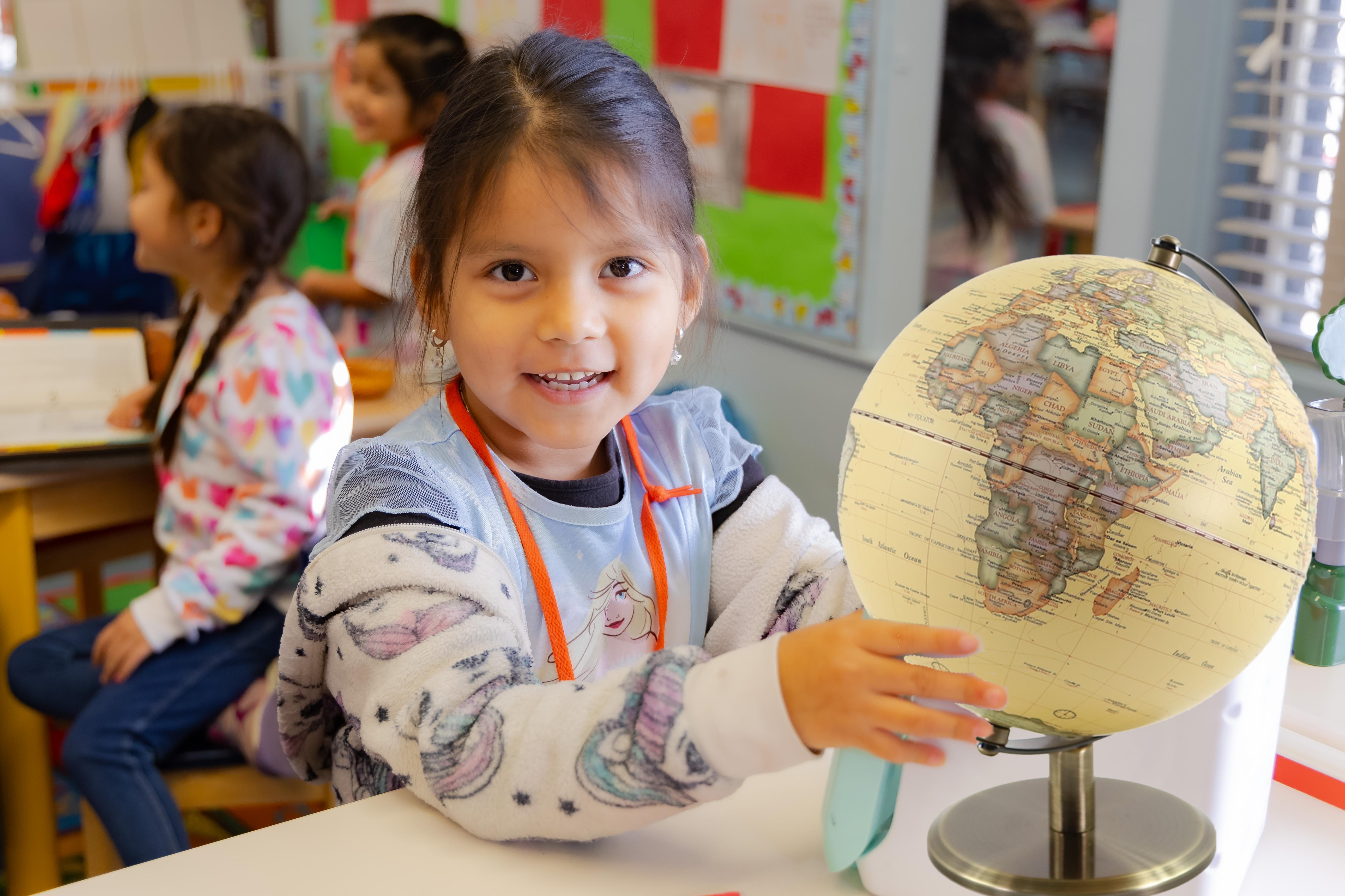 Student with globe