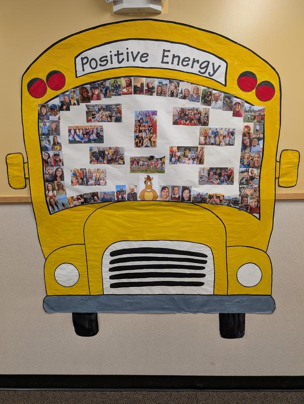 School bus with staff photos