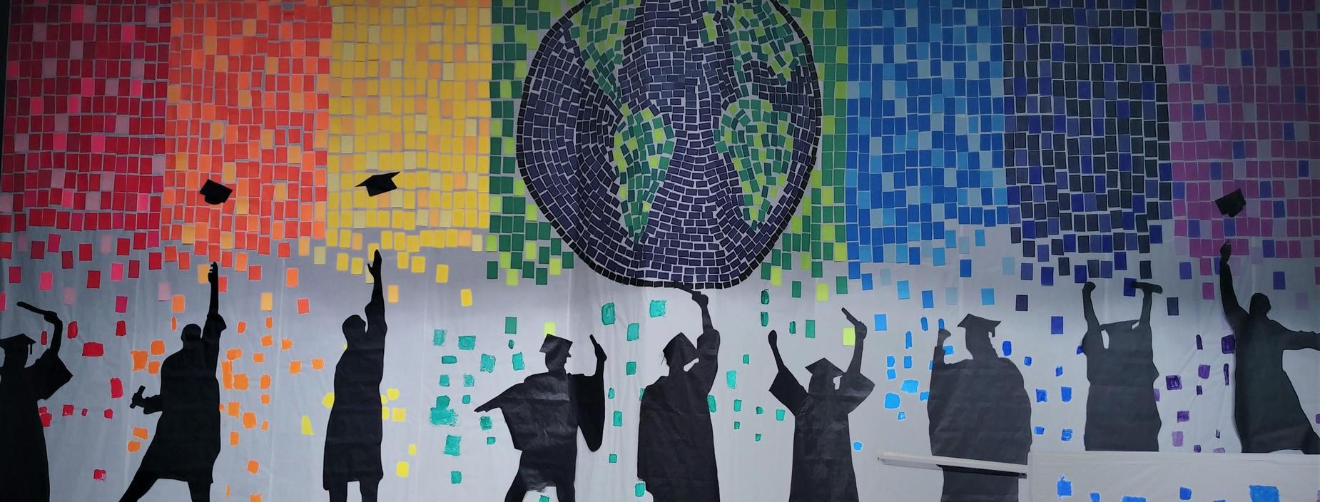 Rainbow mosaic of graduate silhouettes under the world.