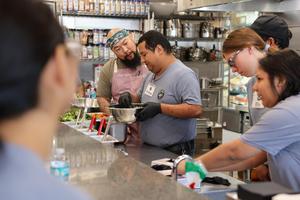 Students with Kitchen tABLE learn culinary skills