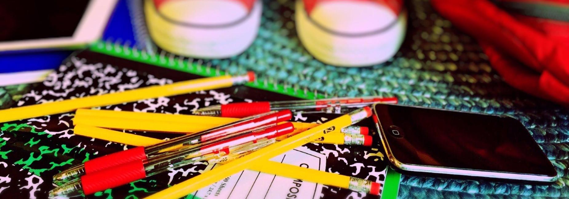 Pencils and pads on floor