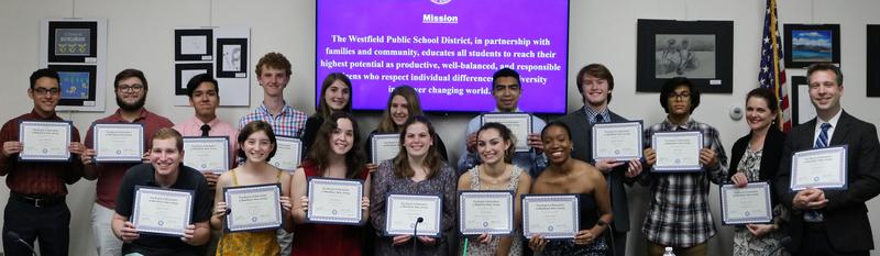 Photo of Westfield High School chorus members and their instructors holding Certificates of Recognition at May 21 Board of Education meeting.