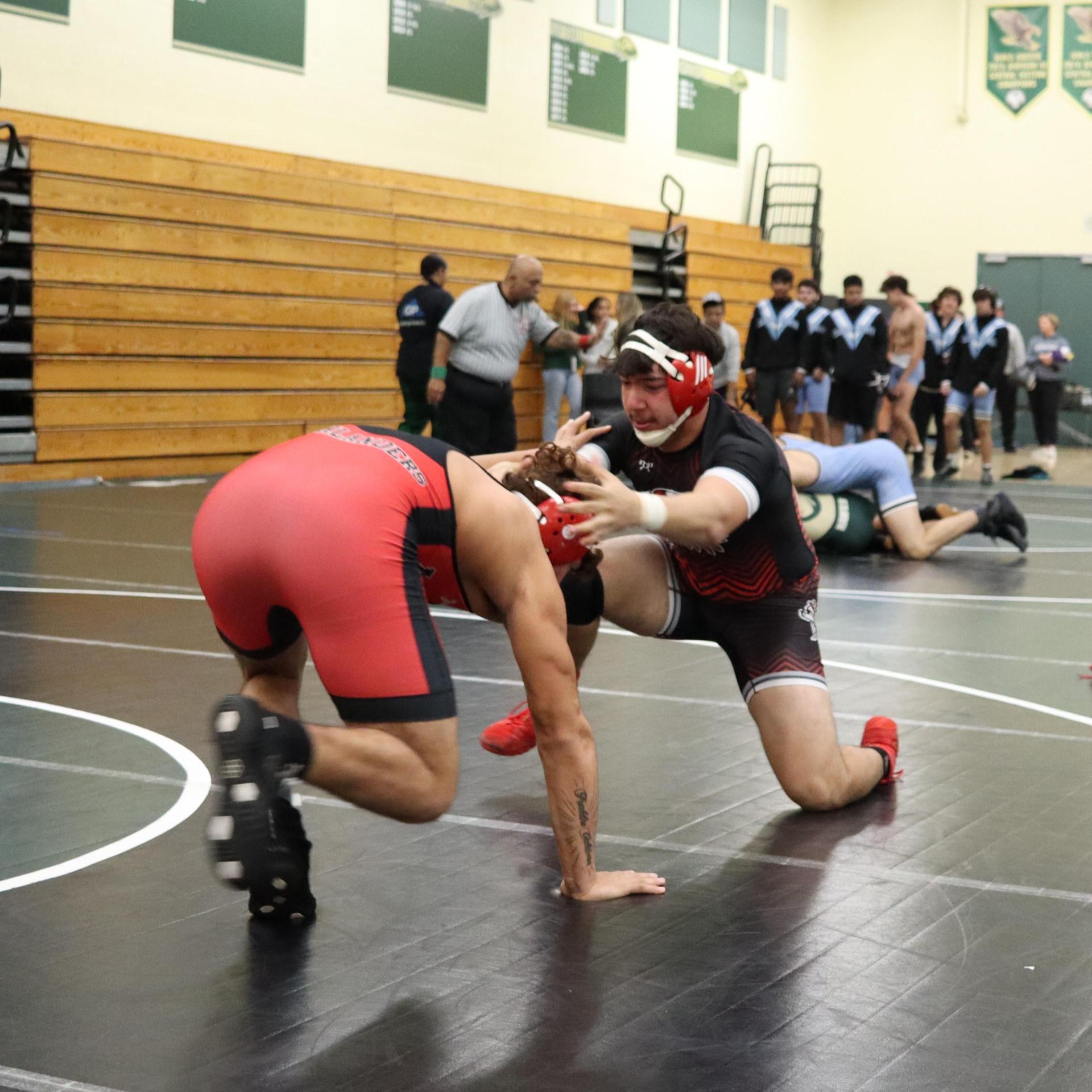 wrestlers in action at the Hawks invitational