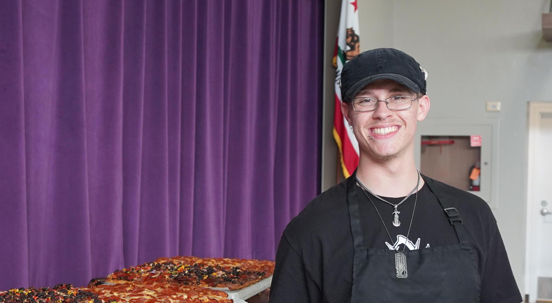 Culinary student shows off his pizza making skills