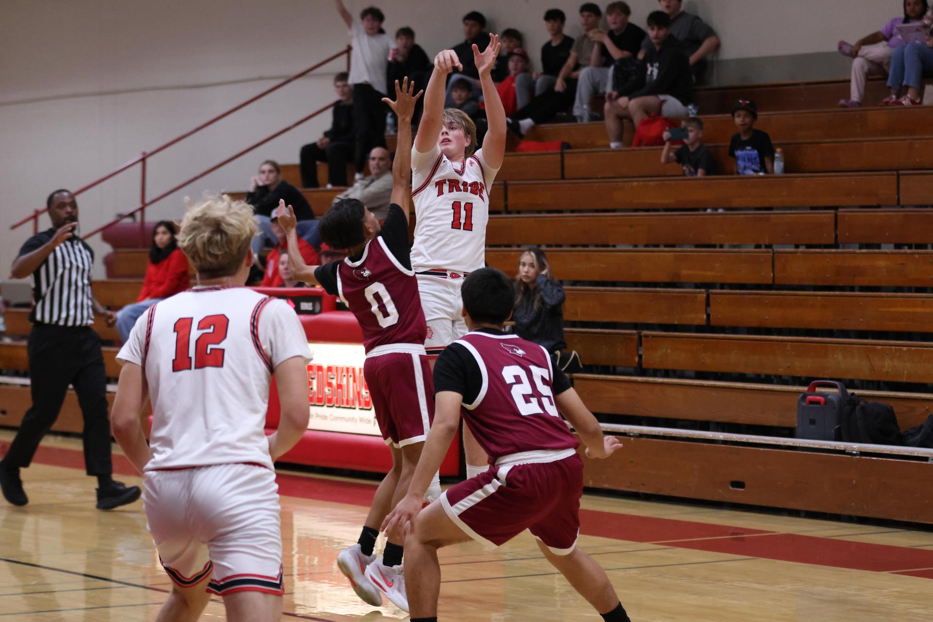 Varsity Boys Basketball playing vs. Orosi 59