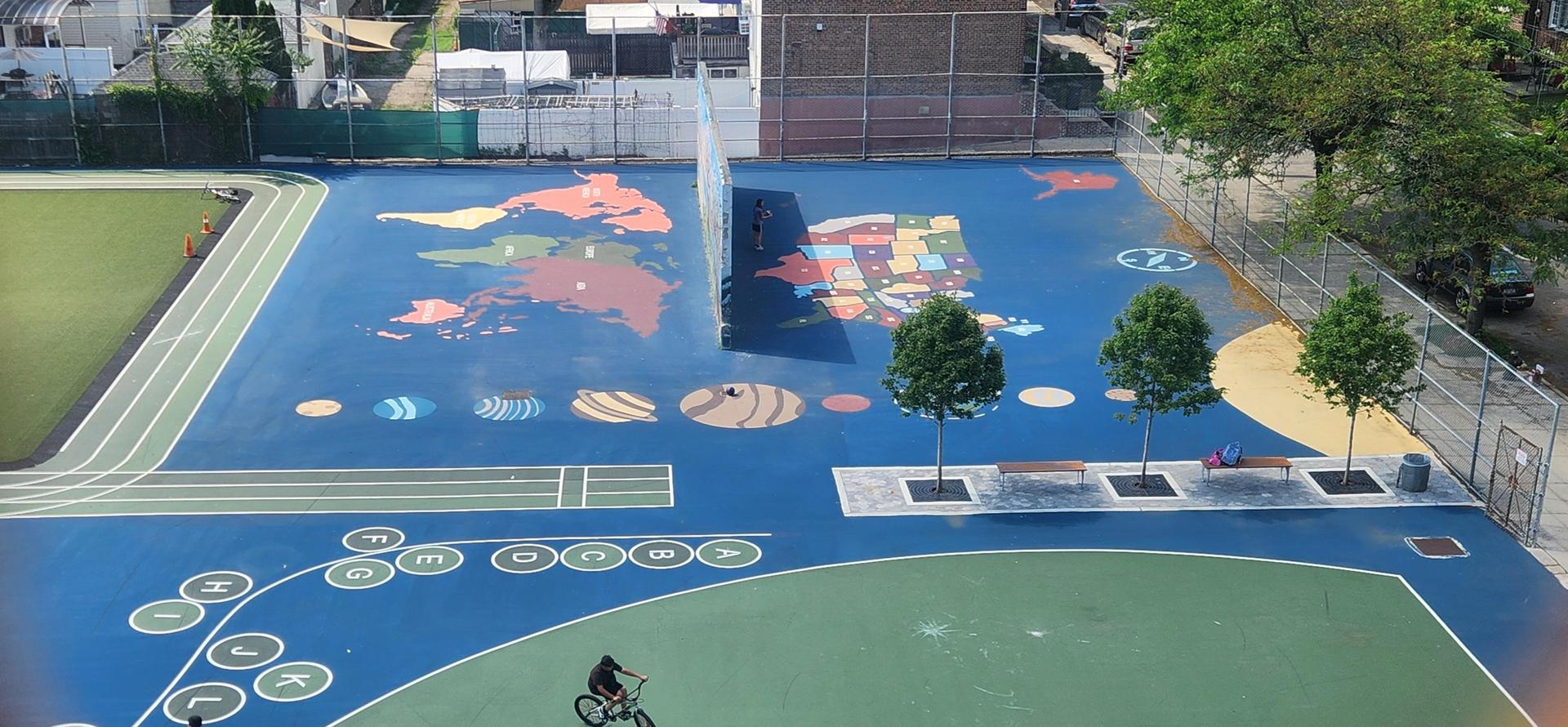 Colorful playground featuring a world map, state outlines, planets, and geometric patterns.