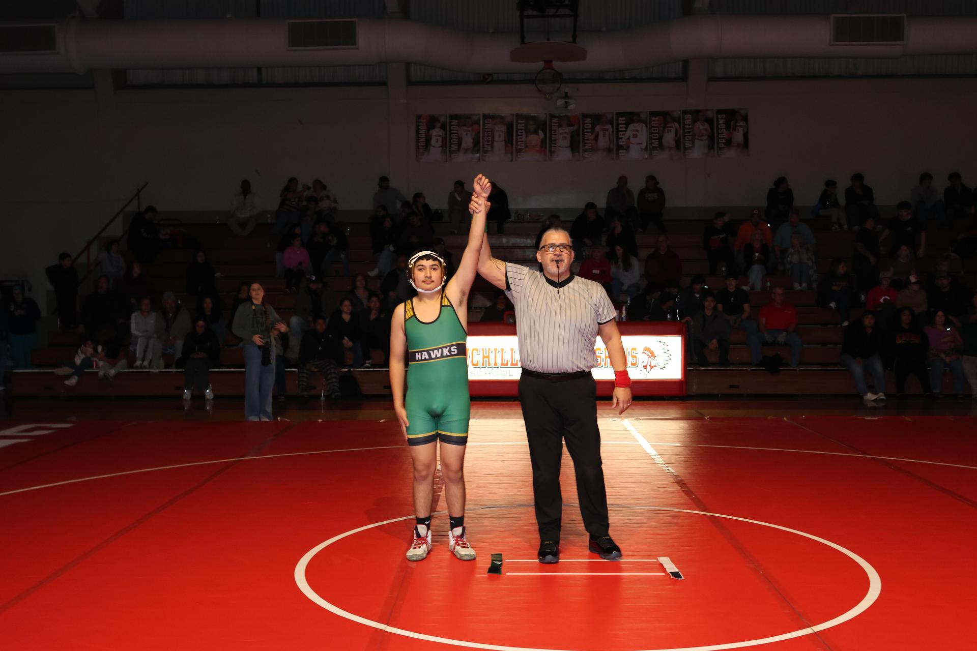 Wrestling winners with hands up 93
