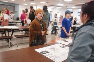 A student portrays Rosa Parks at the Page Wax Museum.