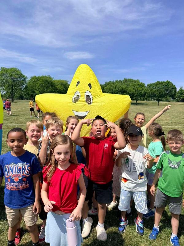 all star mascot with kids