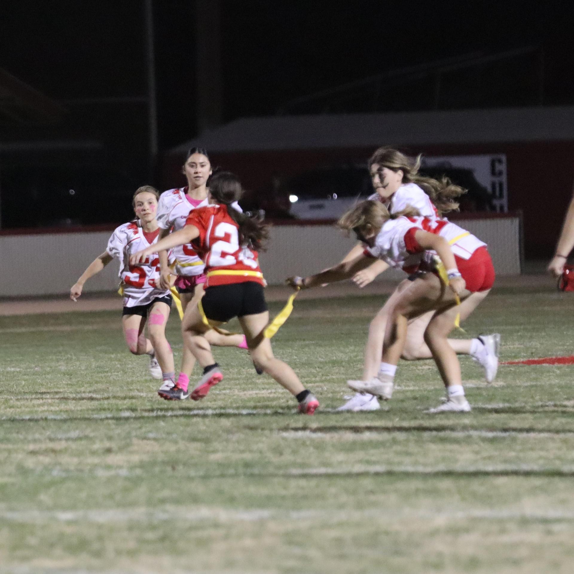 girls playing flag football