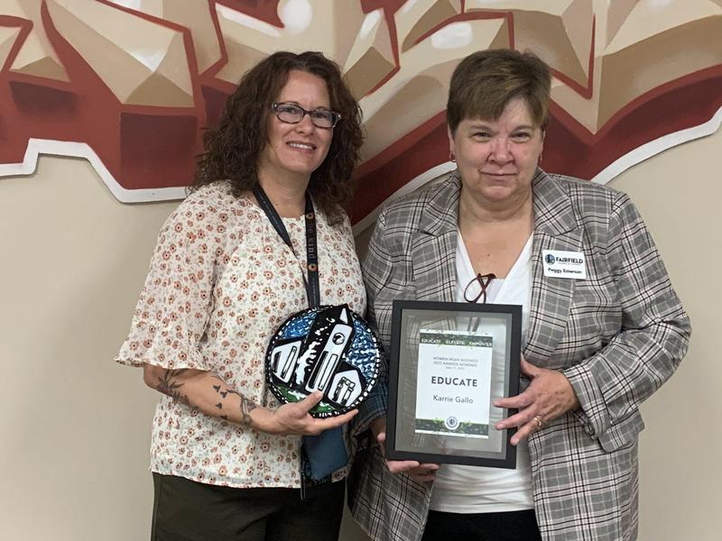Karrie Gallo poses with Peggy Emerson, President of the Chamber of Commerce , after receiving a Teacher of the Year Award.