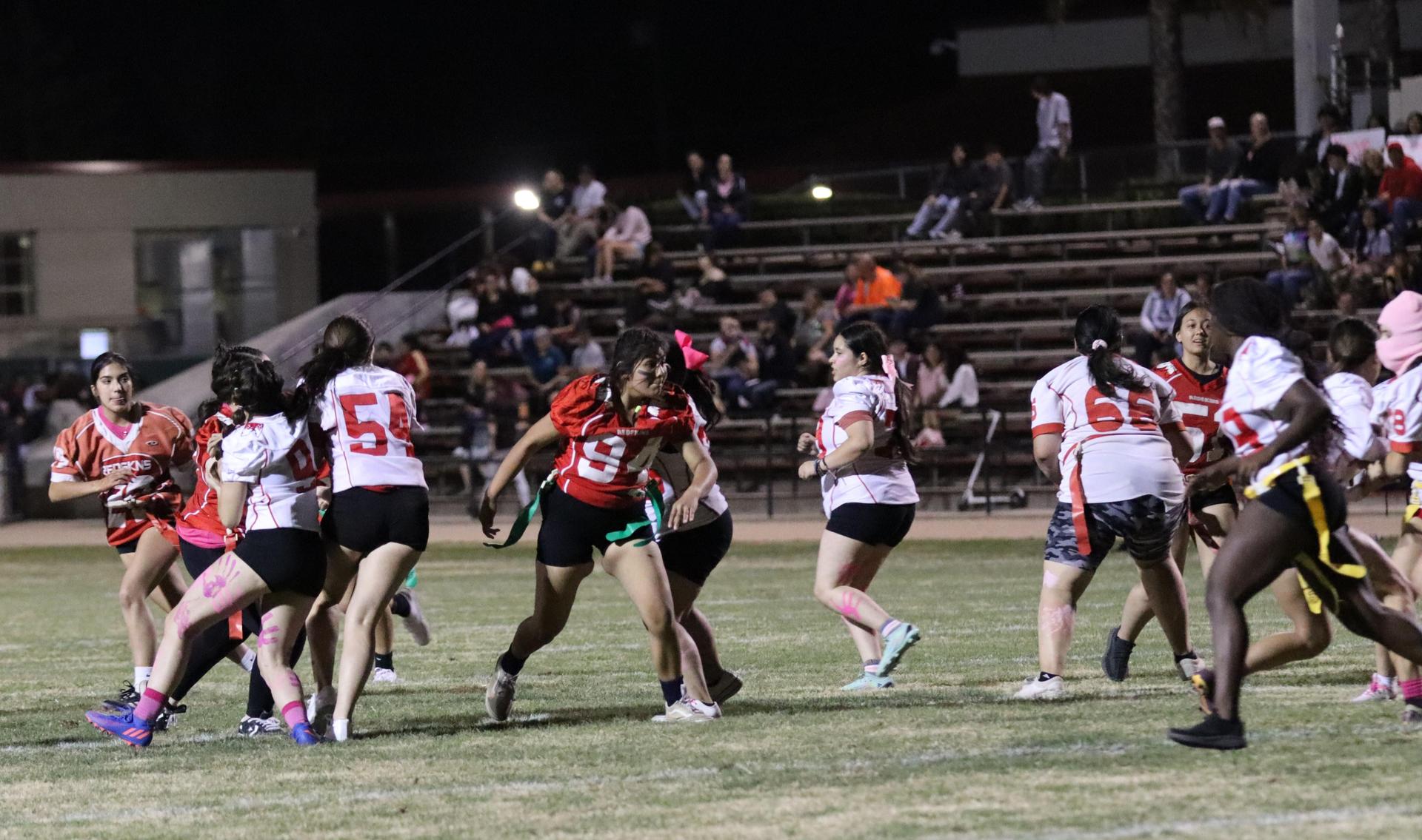 girls playing flag football