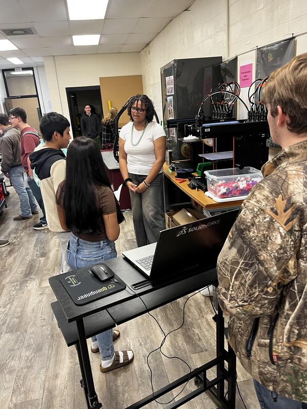 Jessie leading a demonstration on 3D printing