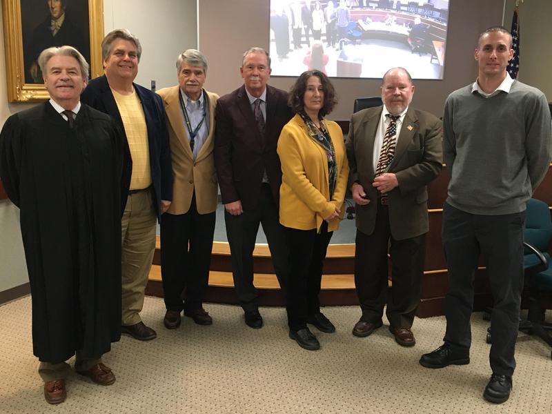 The Honorable Charles Conway administered the Oath of Office to the newly elected FR School Directors: Mr. Ed Mittereder, Mr. Herb Yingling, Mr. Gary English, Mrs. Debra Wohlin, Mr. Bill Yant, and Mr. Scott Weinman at the Reorganization Meeting of the Franklin Regional School Board on December 5, 2019. Officers of the Board for 2019-20 are Mr. Yingling, President, Mr. Paul Scheinert, Vice President, and Mr. Scott Weinman, treasurer