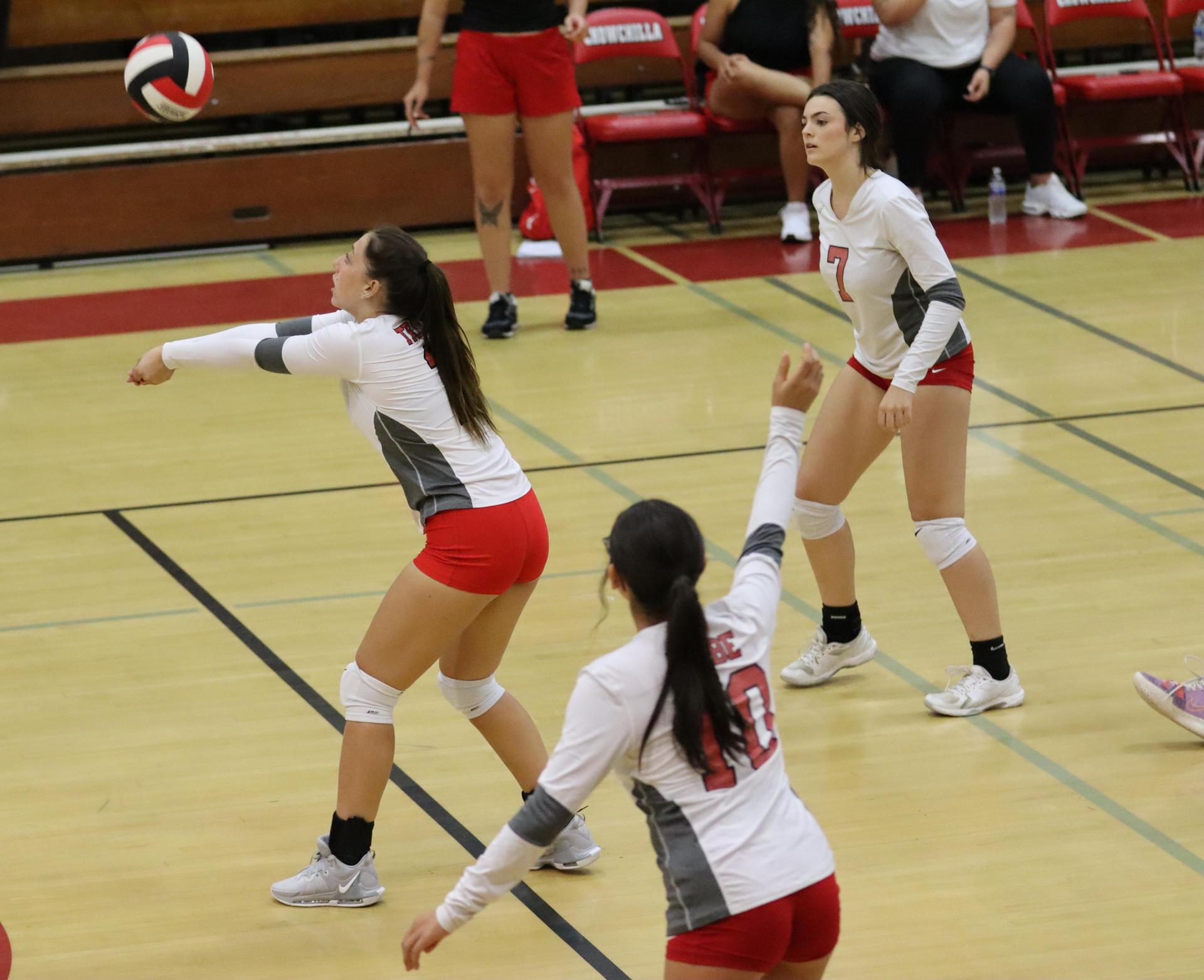 junior varsity girls playing volleyball against Liberty