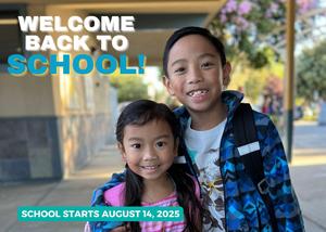 Two students wearing backpacks