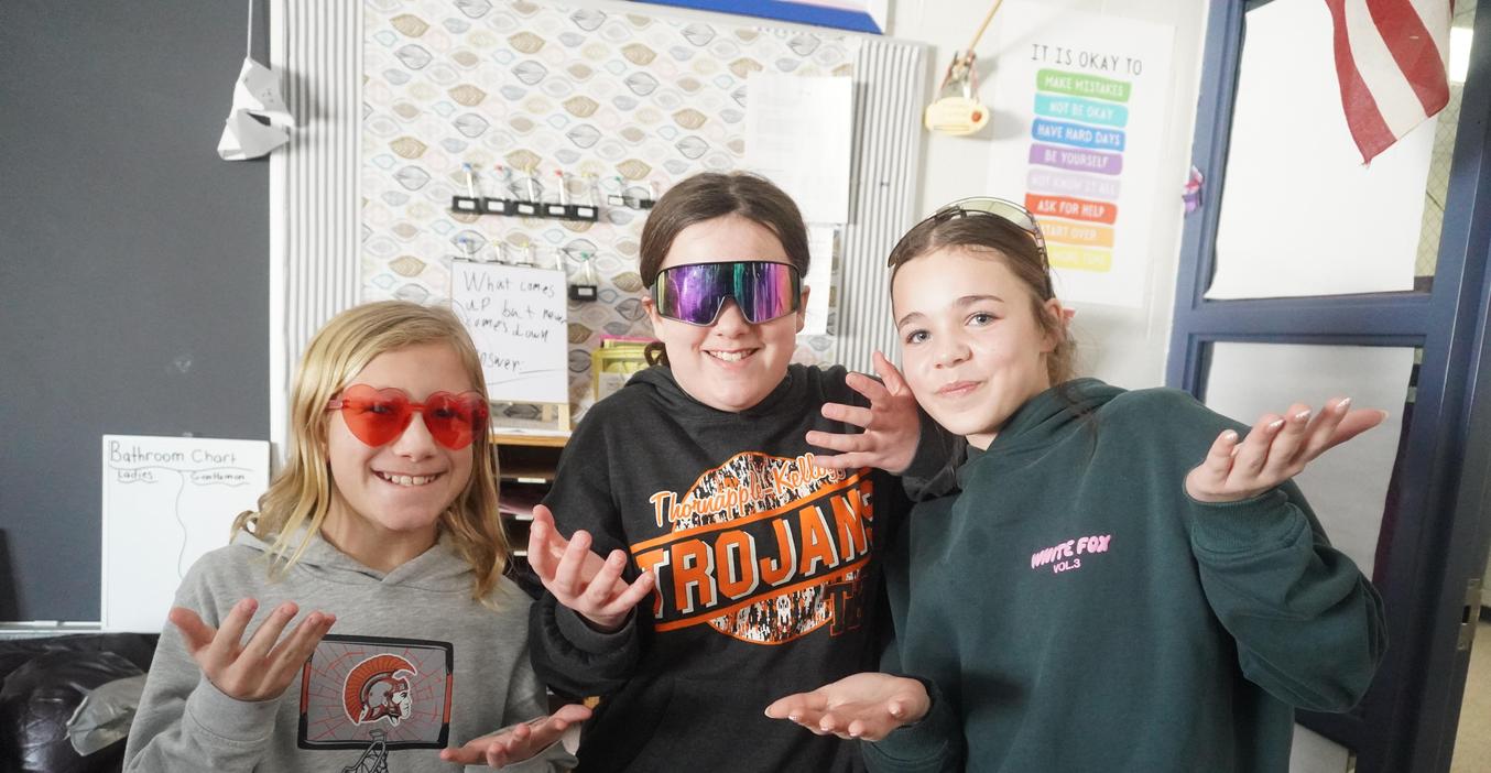 Three Page students enjoy wearing their sunglasses during "It's Cool to be Kind" day.