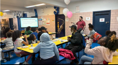 Assistant principal giving presenting data information to the parents