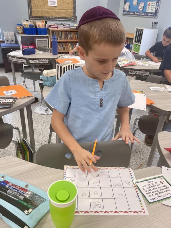 3rd grade boy playing scoot