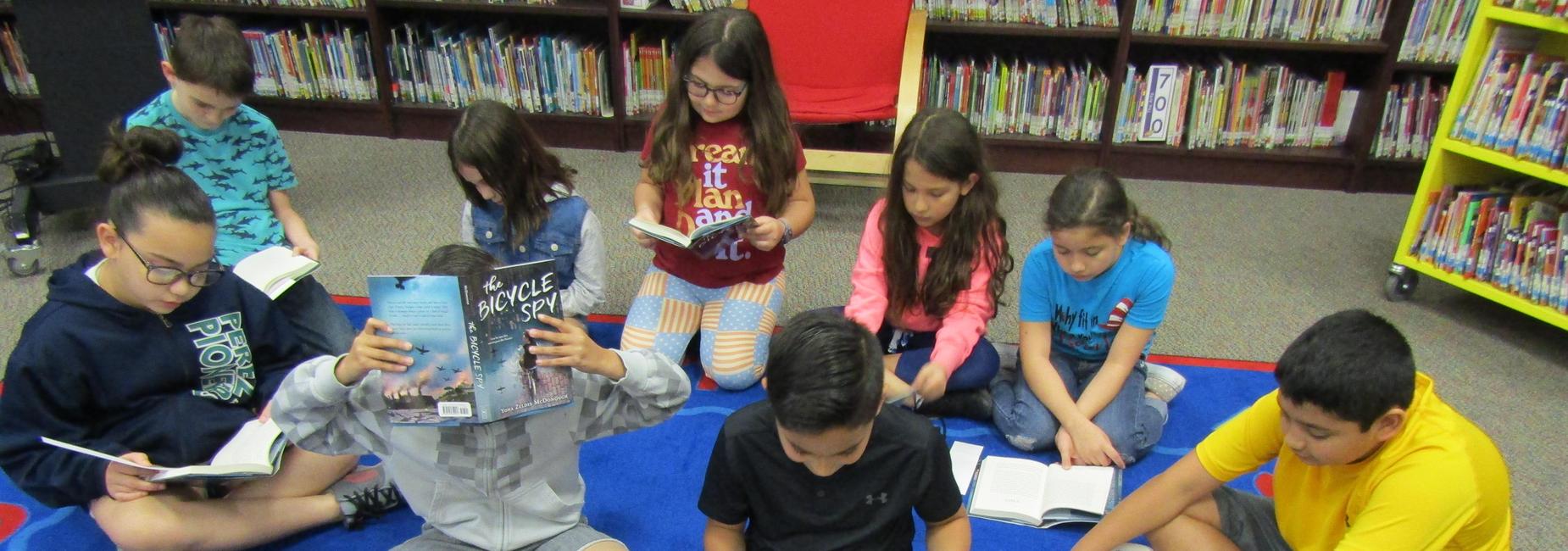 The Bicycle Club reading The Bicycle Spy for their first novel.