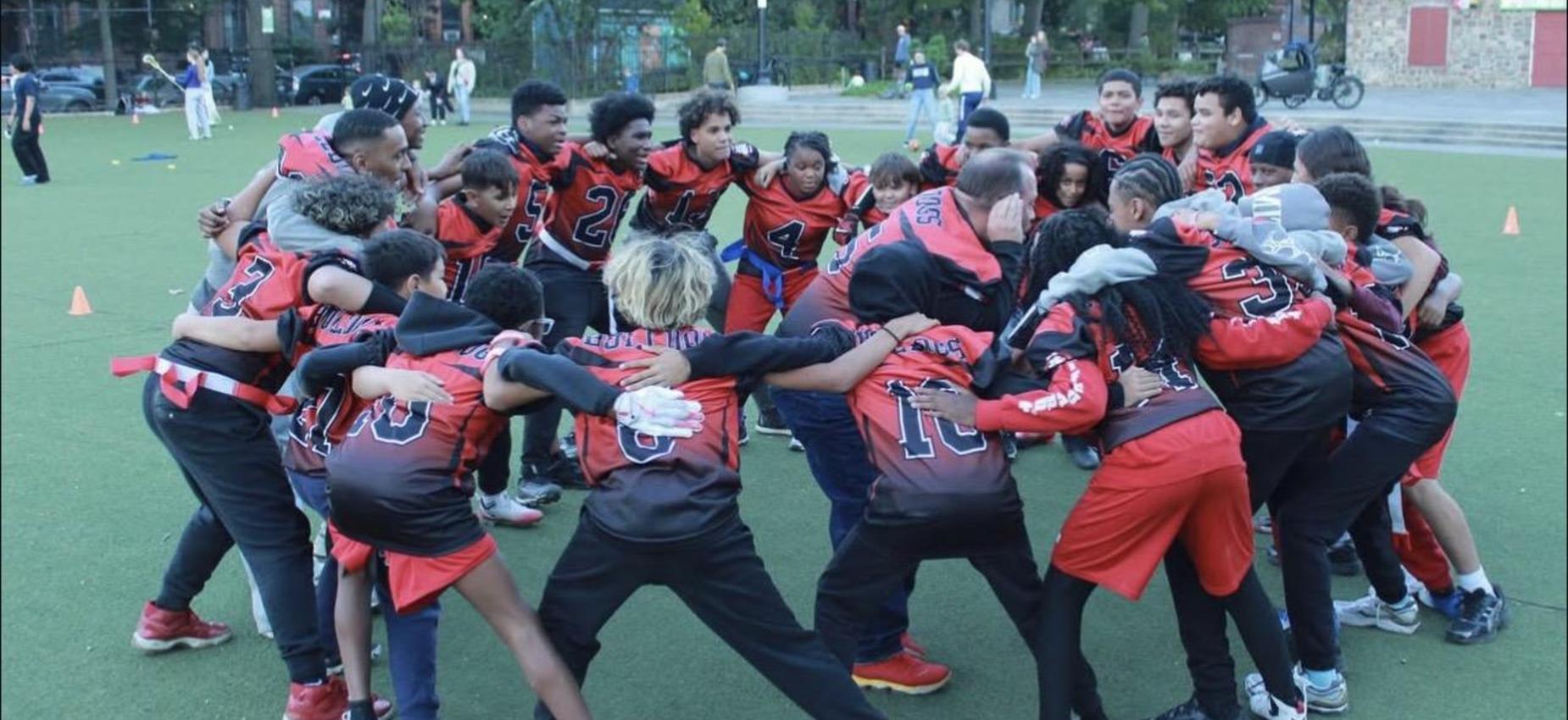 Coach Fiola hyping up our flag football boys