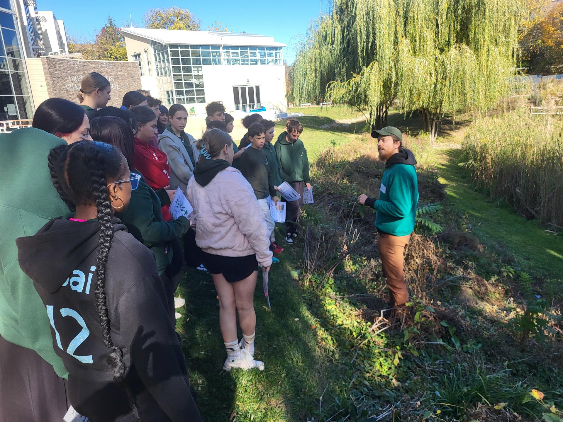 Arborist and 8th grade students