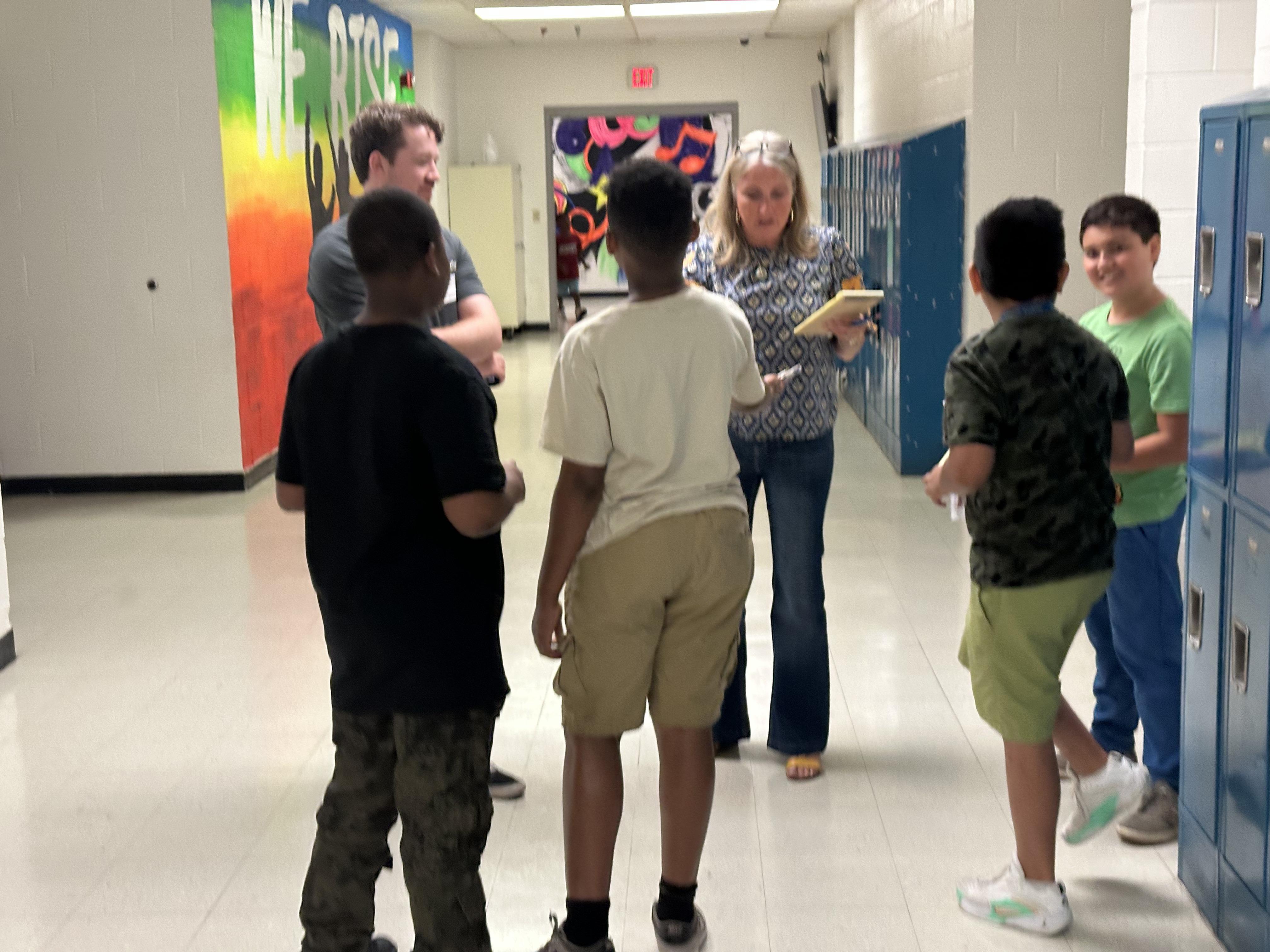 students working with adults