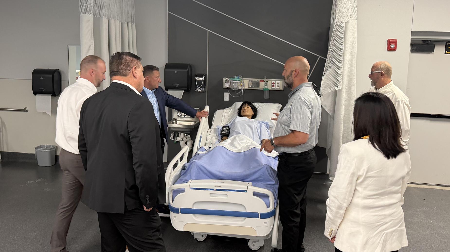School Board members and Mr. Kirkpatrick touring the new medical area of the CTE wing