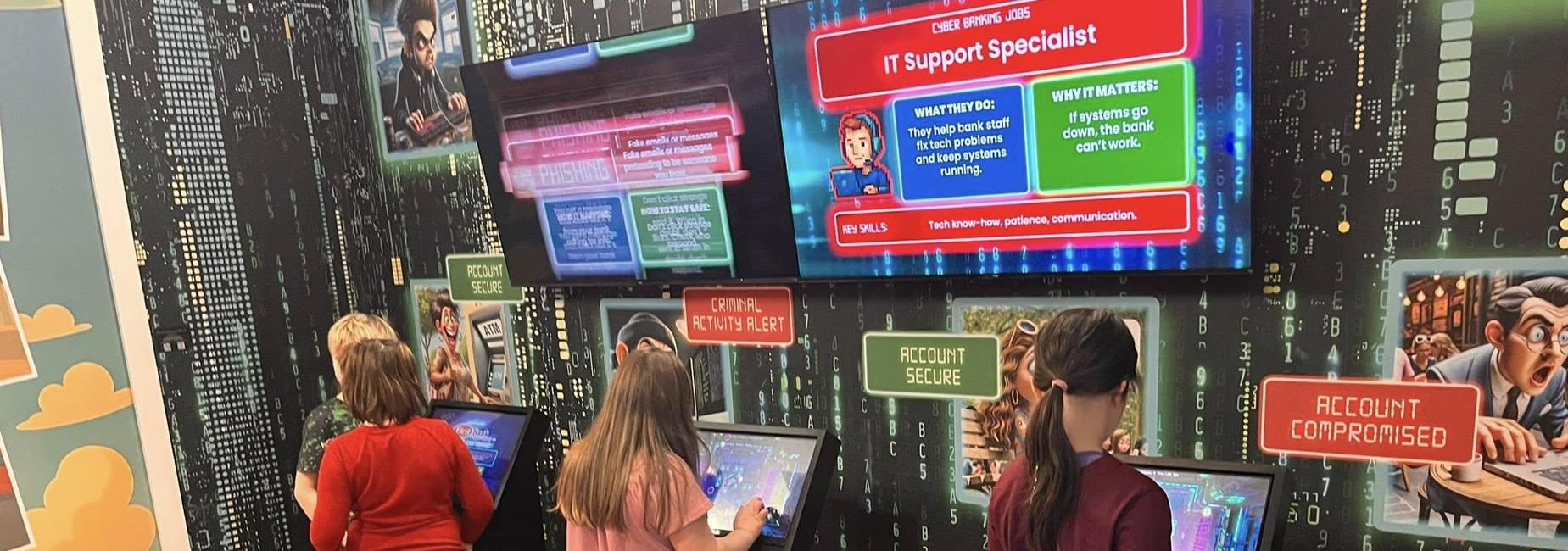 Students getting hands on IT learning on field trip to EO in Abingdon.