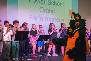 Lower schooler Preforming on Flutes During Talent Show