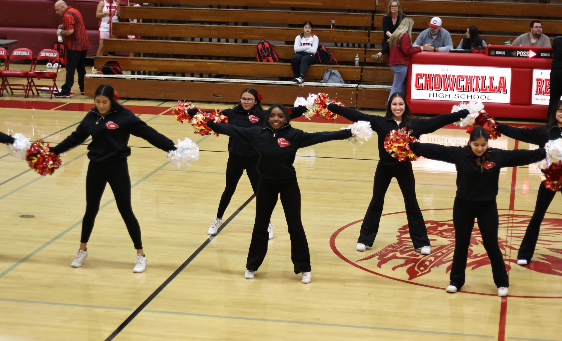 varsity cheerleaders in action