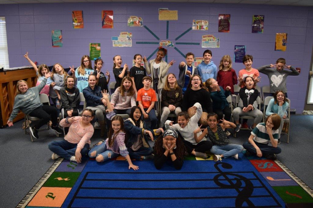 Bridget Burgess, music teacher with her class