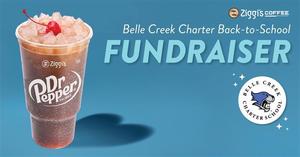 clear cup with Dr. Pepper, text with information about Spirit Night