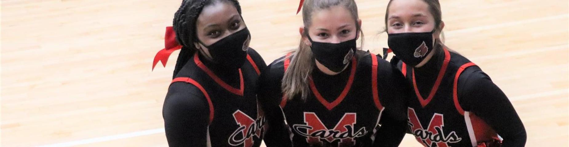 Our Cheerleaders coming out to cheer on our Cards!
