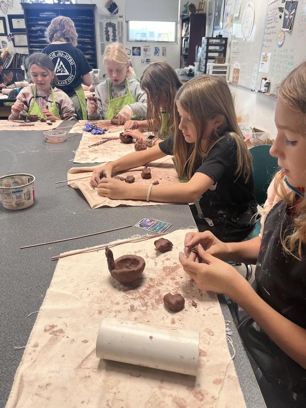 Students making clay art