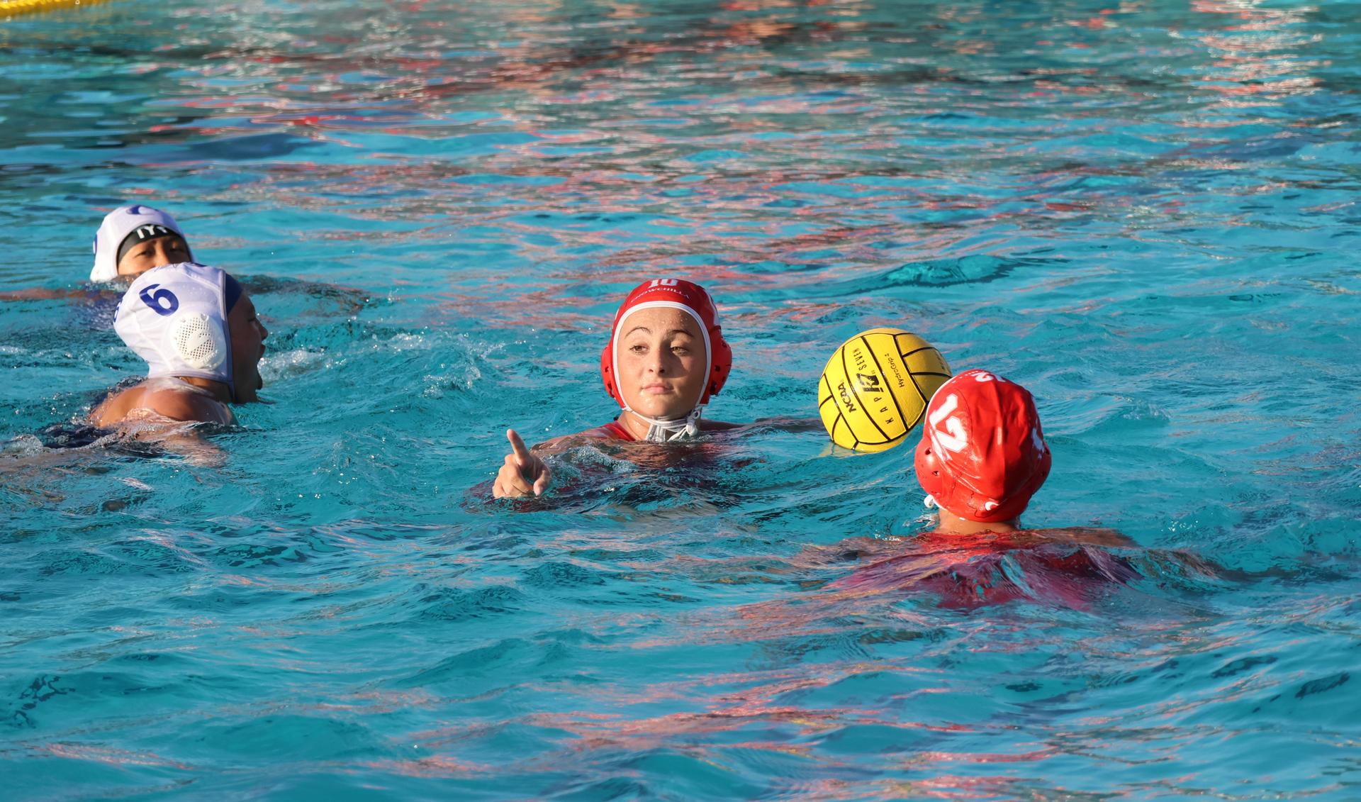girls playing water polo against Sanger West