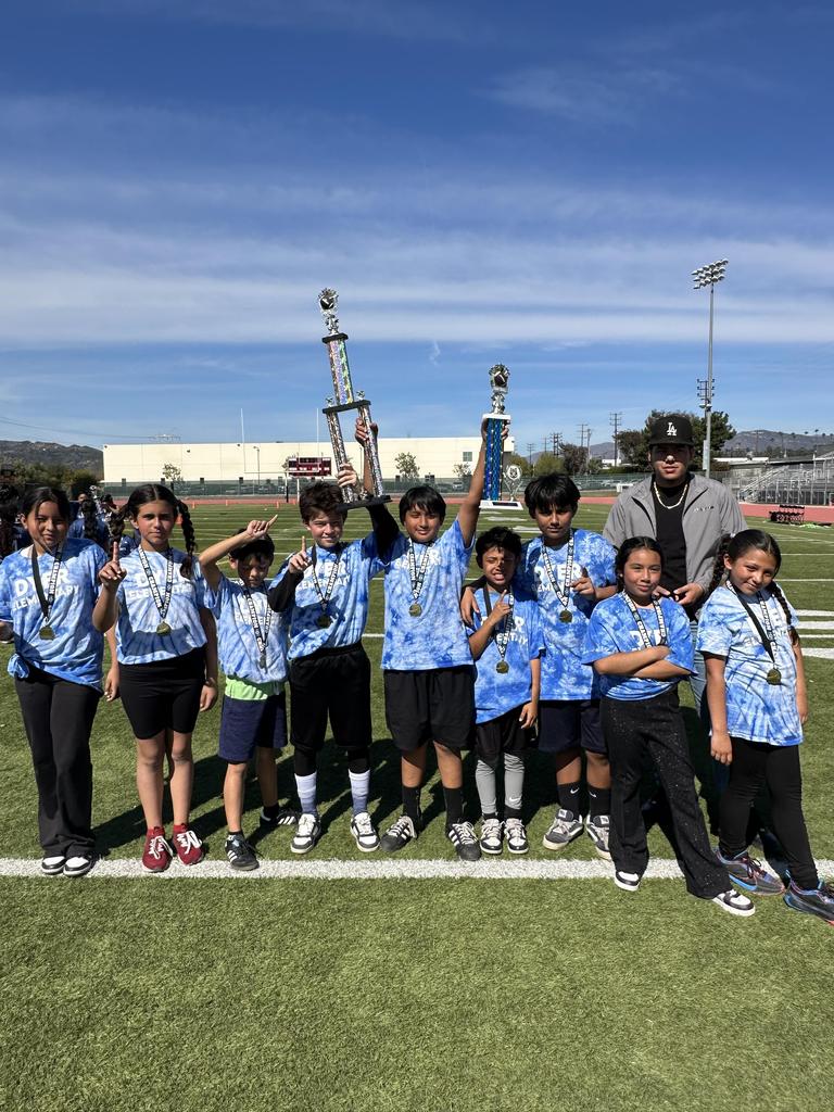 Flag Football team with trophy