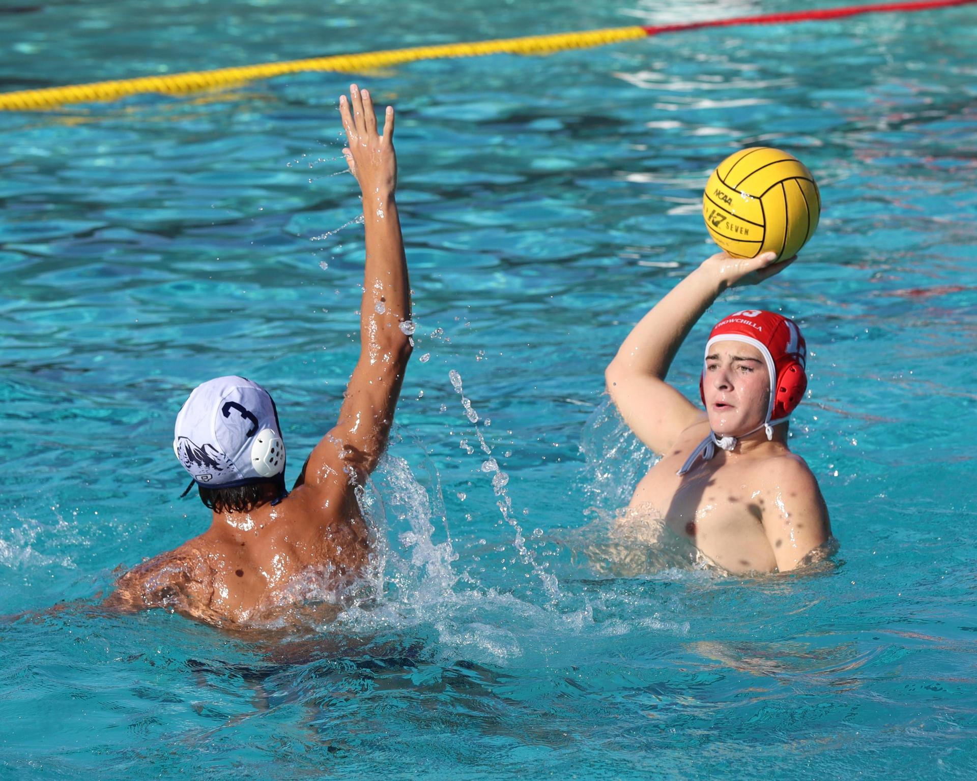 Boys playing water polo against Yosemite