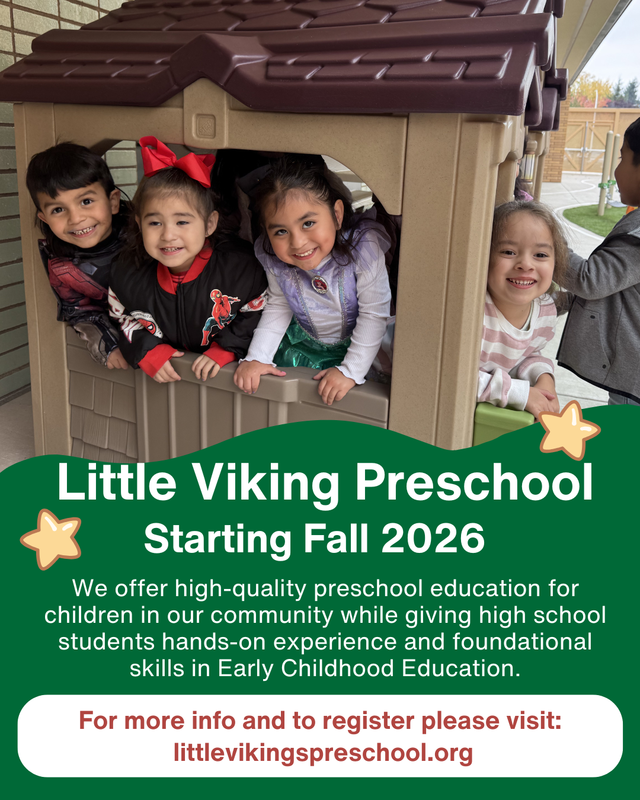 preschool children in plastic house smiling for camera