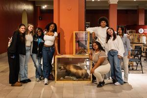 Some Woodland Hills student leaders pose with a stuffed Wolverine