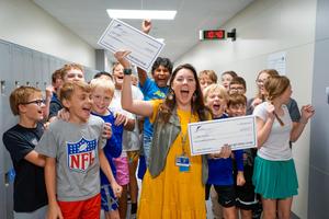 Sarah Denning celebrates with Frenship Foundation Teacher Grant Checks