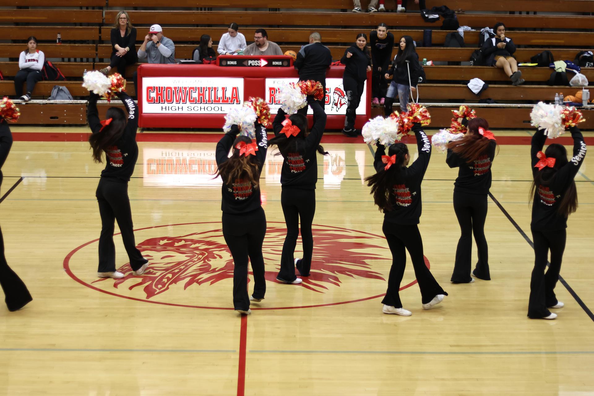 varsity cheerleaders in action